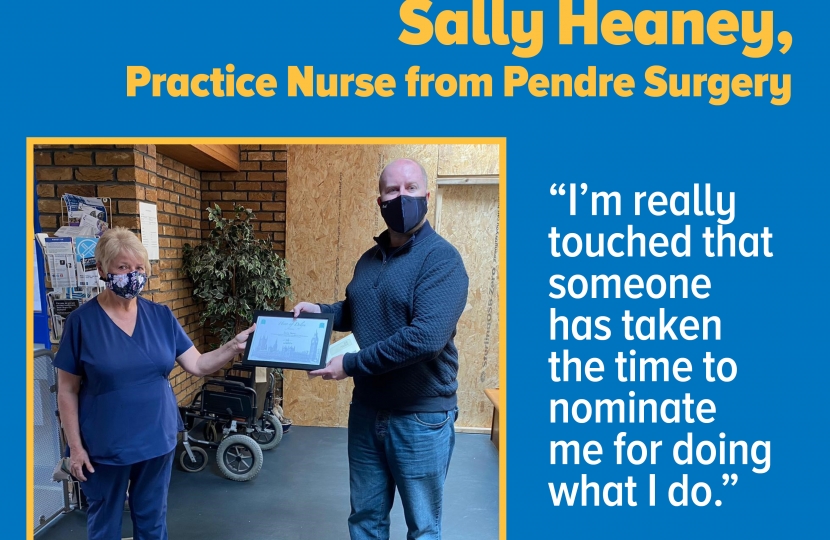 Rob presents Sally with her Unsung Hero Award